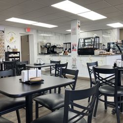 Coffee & Crumbs - Quiet front seating area, plenty of comfy couches and chairs too and multiple rooms.