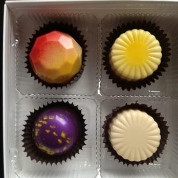 Glacier Confection - Mystery (I think it was butterscotch ;), lemoncello, pb&j, and signature white! Yum! - Chocolatiers & Shops Near Me - Tulsa, Oklahoma Glacier Confection - Mystery (I think it was butterscotch ;), lemoncello, pb&j, and signature white! Yum! - Chocolatiers & Shops Near Me - Tulsa, Oklahoma