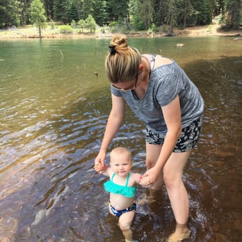 Lake Almanor - Baby girl enjoying the shallow end - Lakes Near Me Lake Almanor - Baby girl enjoying the shallow end - Lakes Near Me