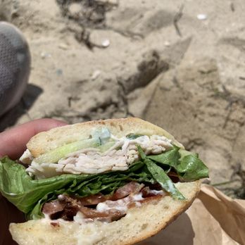 Espresso Love - a hand holding a sandwich - Coffee & Tea Near Me - Edgartown, Massachusetts Espresso Love - a hand holding a sandwich - Coffee & Tea Near Me - Edgartown, Massachusetts