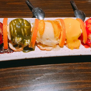 Ramen Bar Ichi - Vanilla ice cream with syrup on the top (left to right): honey caramel, matcha, orange, mango, strawberry - Ramen Near Me - Houston, Texas Ramen Bar Ichi - Vanilla ice cream with syrup on the top (left to right): honey caramel, matcha, orange, mango, strawberry - Ramen Near Me - Houston, Texas