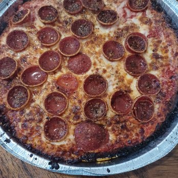 Mikey's Late Night Slice - Unsliced pizza. Still delicious. - Bars Near Me - Columbus, Ohio