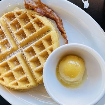 Wally Waffle - Honey Butter Waffle with a piece of bacon from wife's The Ultimate BLT Sandwich - Breakfast & Brunch Near Me - Akron, Ohio Wally Waffle - Honey Butter Waffle with a piece of bacon from wife's The Ultimate BLT Sandwich - Breakfast & Brunch Near Me - Akron, Ohio