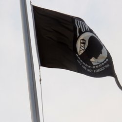 POW-MIA flag waves above the park. You Are Not Forgotten.