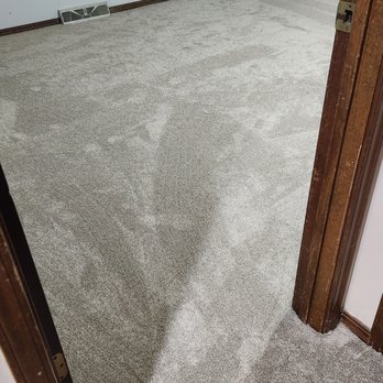 Precision Flooring - a clean carpet in a room - Flooring Near Me