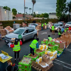 Serve the People - A bird's eye view of our bi-weekly Food Pantry, which takes place from 4:30-7:30 A.M. every first and third Saturday of the month.