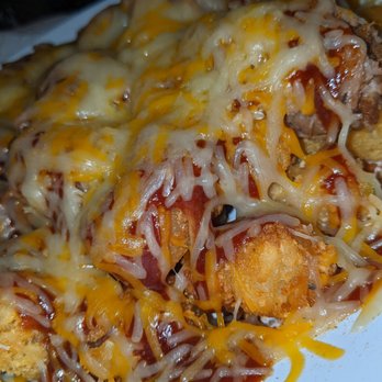 Johnny's Other Side - Pork Tot-chos...recommended...I did leave the salad off and added sour cream... - Sports Bars Near Me - Orlando, Florida Johnny's Other Side - Pork Tot-chos...recommended...I did leave the salad off and added sour cream... - Sports Bars Near Me - Orlando, Florida