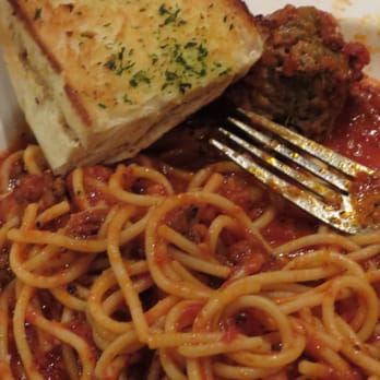 La Pizza Rina - Garlic Cheese Bread placed atop the Spaghetti with Meatballs - Italian Near Me - Honolulu, Hawaii