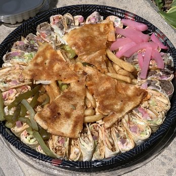 Shawarma X - a plate of food on a table - Middle Eastern Near Me - Oakville, Ontario Shawarma X - a plate of food on a table - Middle Eastern Near Me - Oakville, Ontario
