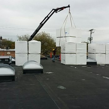 Croixco Construction - Roof loading insulation board on an upcoming Johns Manville TPO roof project in Schaumburg IL - Windows Installation Near Me - Schaumburg, Illinois Croixco Construction - Roof loading insulation board on an upcoming Johns Manville TPO roof project in Schaumburg IL - Windows Installation Near Me - Schaumburg, Illinois