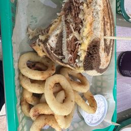 Reuben Sandwich with cauliflower "onion" rings and a side of ranch. Reuben Sandwich with cauliflower "onion" rings and a side of ranch.