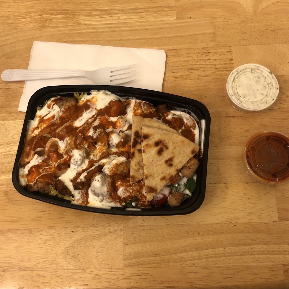 Box'd Kitchen - a plate of food on a table - Mediterranean Near Me - Vienna, Virginia Box'd Kitchen - a plate of food on a table - Mediterranean Near Me - Vienna, Virginia