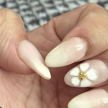Soleil Luna Nail Spa - Lint on thumb, pointer, and ring finger. Pinky nail already came off. - Nail Salons Near Me - San Mateo, California
