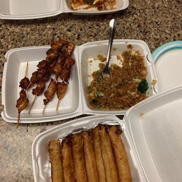 Chicken teriyaki, veggie spring rolls and fried rice. Chicken teriyaki, veggie spring rolls and fried rice.