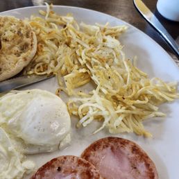 The "crispy" hash browns as served, totally cold in the middle and undercooked overall.