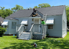 Slide of Dutchmark Roofing