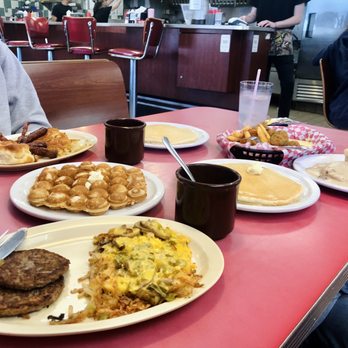 Wynn's Diner - a man sitting at a table with plates of food - Diners Near Me - Asheville, North Carolina Wynn's Diner - a man sitting at a table with plates of food - Diners Near Me - Asheville, North Carolina
