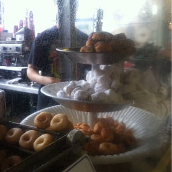 Daily Dozen Doughnut - It's hypnotic watching these little babies drop - Bakeries Near Me - Seattle, Washington