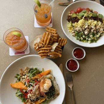 Ilima Terrace - ILIMA'S HAWAIIAN PESTO CRUSTED MAHIMAHI & PRAWN SALAD, ISLAND COBB SALAD, TRUFFLE WAFFLE FRIES. Drinks: Trade Winds, Fresh Fruit Sparkler - American Near Me - Koloa, Hawaii Ilima Terrace - ILIMA'S HAWAIIAN PESTO CRUSTED MAHIMAHI & PRAWN SALAD, ISLAND COBB SALAD, TRUFFLE WAFFLE FRIES. Drinks: Trade Winds, Fresh Fruit Sparkler - American Near Me - Koloa, Hawaii