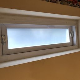 Frosted basement window. That is my car wheel outside. You can barely see it! Love the privacy.