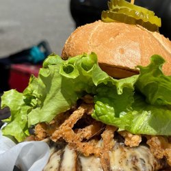 Low & Slow BBQ - Mushroom Swiss Burger- marinated strips of portobello and crispy fried onions adorn our signature patty with swiss cheese - fully dressed!