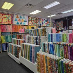 Quilts and Lace - Nice and colorful fabric selection