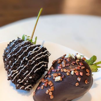 Y Lounge - two chocolate covered strawberries on a plate - Lounges Near Me - Highland, California Y Lounge - two chocolate covered strawberries on a plate - Lounges Near Me - Highland, California