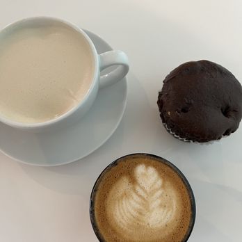 Huckleberry Roasters - a cup of coffee and a pastry - Coffee & Tea Near Me - Denver, Colorado