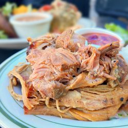 Parada 22 - Pernil Asado: Slow-roasted pork marinated w/ garlic, oregano | $16.50