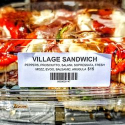 Yiasou Greek Market and Cafe - VILLAGE SANDWICH: PEPPERS, PROSCIUTTO, SALAMI, SOPRESSATA, FRESH MOZZ., EVOO, BALSAMIC, ARUGULA. $15