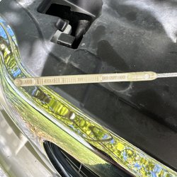 Sam's Tire & Auto Service - dipstick for the transmission fluid was bone dry after they claimed that they filled it up. This is 20 minutes after I left their shop.
