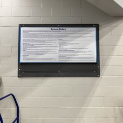 Lowe's Home Improvement - Return policy high on the back wall after Returns hard to read. I told the manager I can't read that, he smirked and said, "I can".