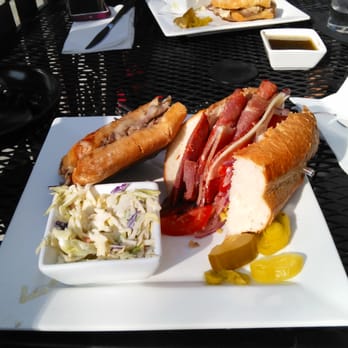 CraSh Lounge - The soprano on the right and the roast beef panini on the left with blue cheese coleslaw - Lounges Near Me - Bakersfield, California