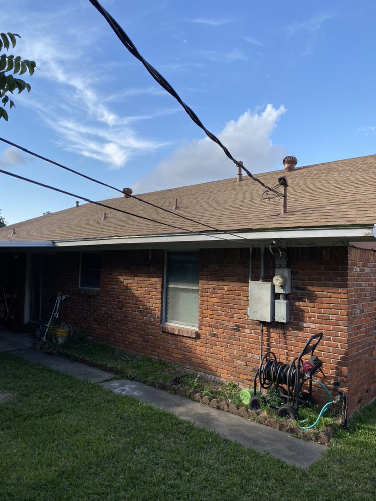 Slide of Quality King Roofing