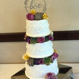 This view is from an angle- the cake really was level : ) This view is from an angle- the cake really was level : )