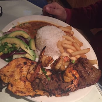 La Cascada Bar & Restaurant - My husband ordered their special which had chicken, shrimp, steak, rice and salad. - Latin American Near Me - Haverstraw, New York