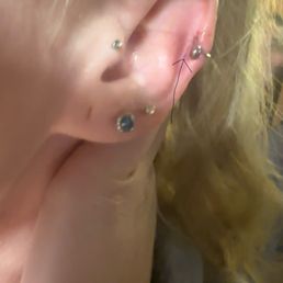 you can see the dot that was made where it was supposed to be pierced. you can see the dot that was made where it was supposed to be pierced.