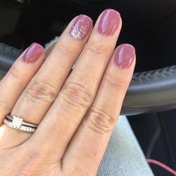 In Style Nails - Gel nails by Kiwi.  If you're on the fence, go see her, her manicures last me three weeks!