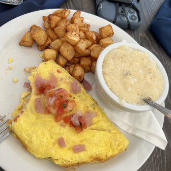 Reveille Coffeehouse Cafe - Omelette with Gouda grits and potatoes - Breakfast & Brunch Near Me - Cumming, Georgia