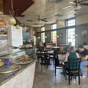 Pezzo Pizza II - people sitting at tables in a restaurant - Italian Near Me - Long Valley, New Jersey Pezzo Pizza II - people sitting at tables in a restaurant - Italian Near Me - Long Valley, New Jersey