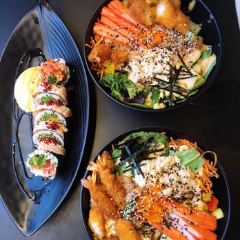 Sushi Sama - two plates of food on a table - Poke Near Me - Montreal, Quebec Sushi Sama - two plates of food on a table - Poke Near Me - Montreal, Quebec