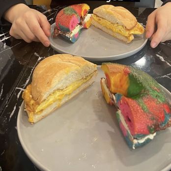 Bagelafe - 2 Eggs w/ cheese on a roll Beef bacon and cream cheese on a rainbow bagel - Delis Near Me - Bethpage, New York