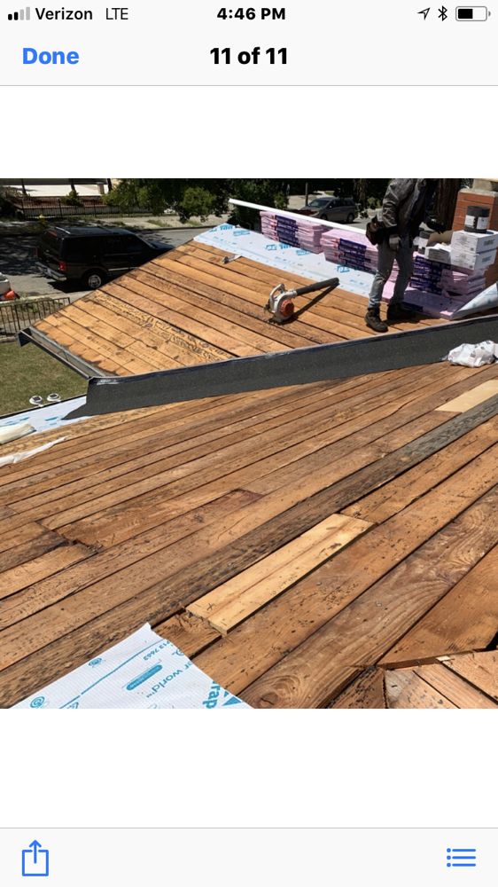 Slide of Michiel Roofing