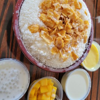 UC Dessert - Mango sago bingsoo with corn flakes, tapioca sago, Mango puree, fresh Mango cubes and condensed milk! - Desserts Near Me - Oakland, California UC Dessert - Mango sago bingsoo with corn flakes, tapioca sago, Mango puree, fresh Mango cubes and condensed milk! - Desserts Near Me - Oakland, California