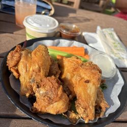 Pau Huaka'i Tiki Bar - Plain wings (the only way I eat wings) the  sauce is on the side.