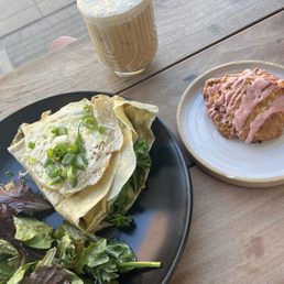 The pesto asparagus crepe, seasonal coffee, and a lemon raspberry scone. The pesto asparagus crepe, seasonal coffee, and a lemon raspberry scone.