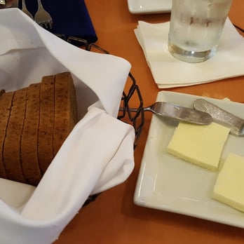 Ale & Compass Restaurant - Bread with sea salt butter - American Near Me - Orlando, Florida Ale & Compass Restaurant - Bread with sea salt butter - American Near Me - Orlando, Florida