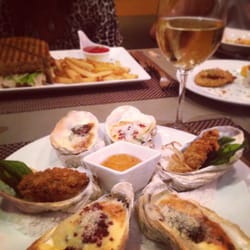 Oyster Sampler and a nice glass of wine!