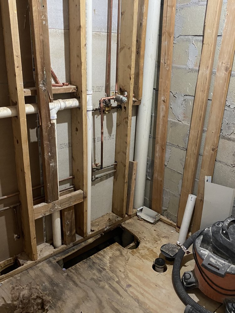 Slide of The in and out plumbing guy