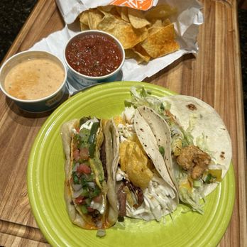 Tacos 4 Life - Left to right: Ultimate nacho, Korean BBQ, Firecracker Shrimp (they forgot to add sauce) - Tacos Near Me - Ballwin, Missouri
